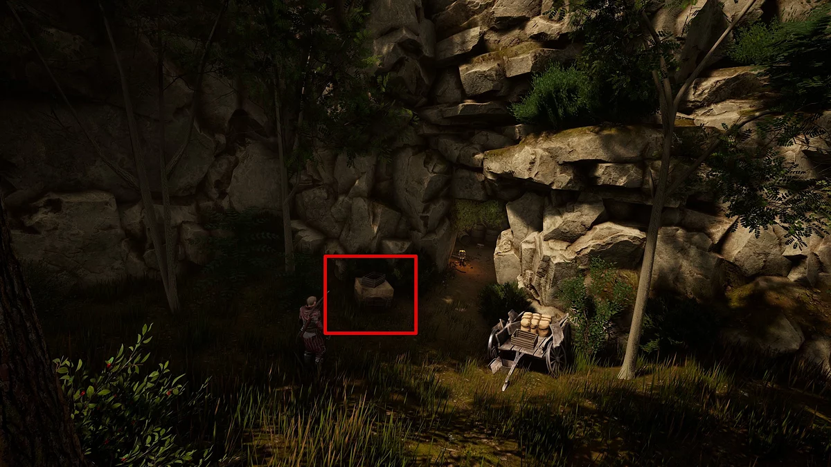 Вход в пещеру с хобстерами и второе колесо возле деревянного ящика