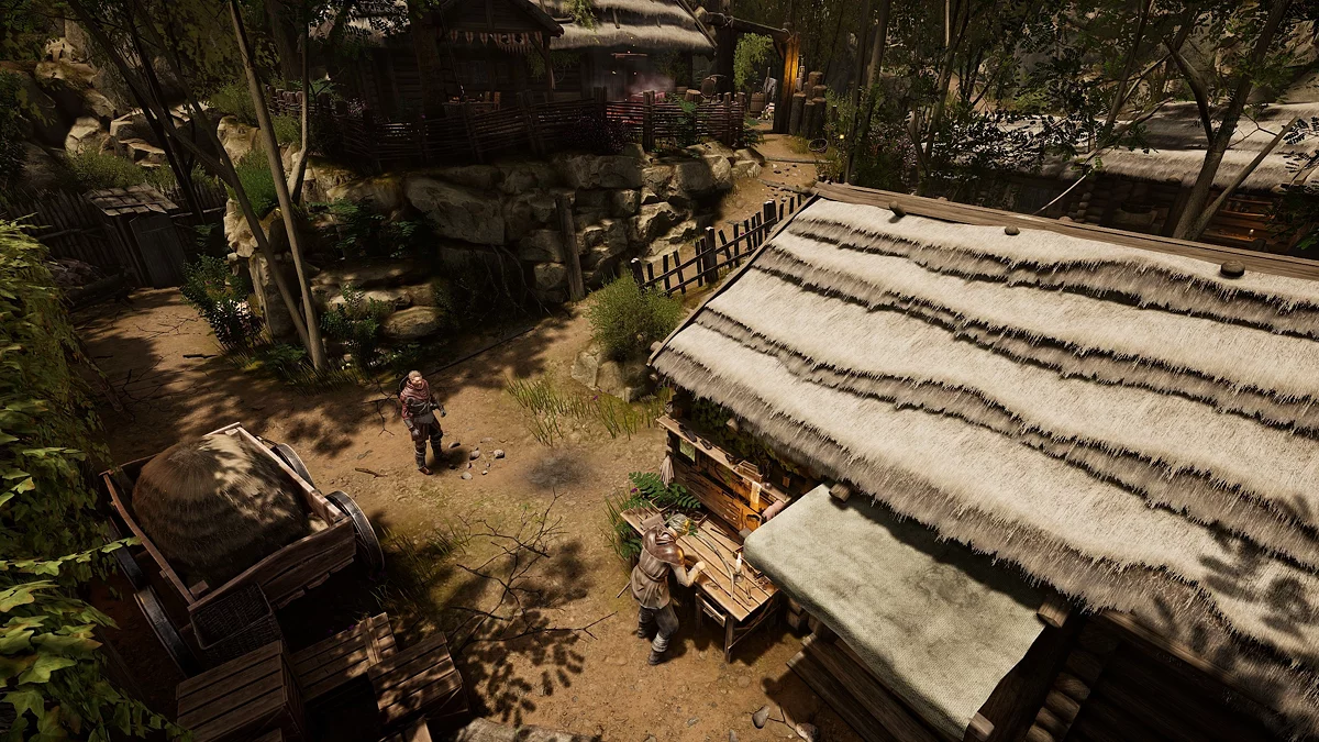 Берд в зелёной шапке работает возле верстака