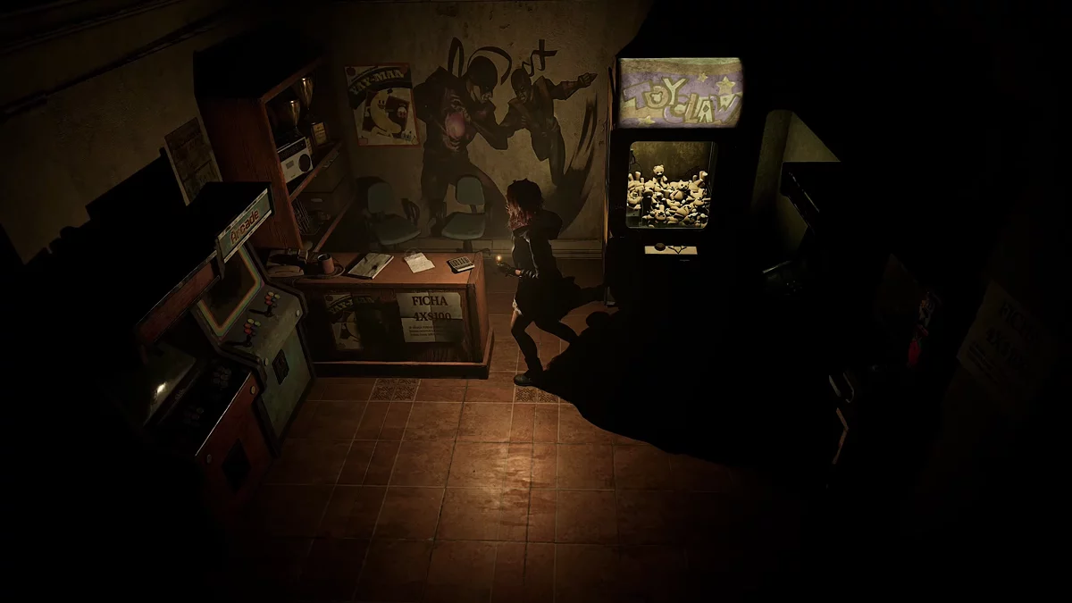 Особое письмо Захарии за столом администратора в зале с аркадными автоматами